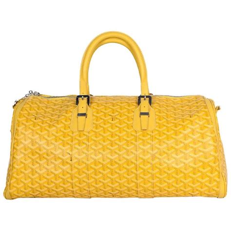 goyard yellow duffle bag.